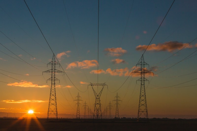 Energy transition sunset over plant